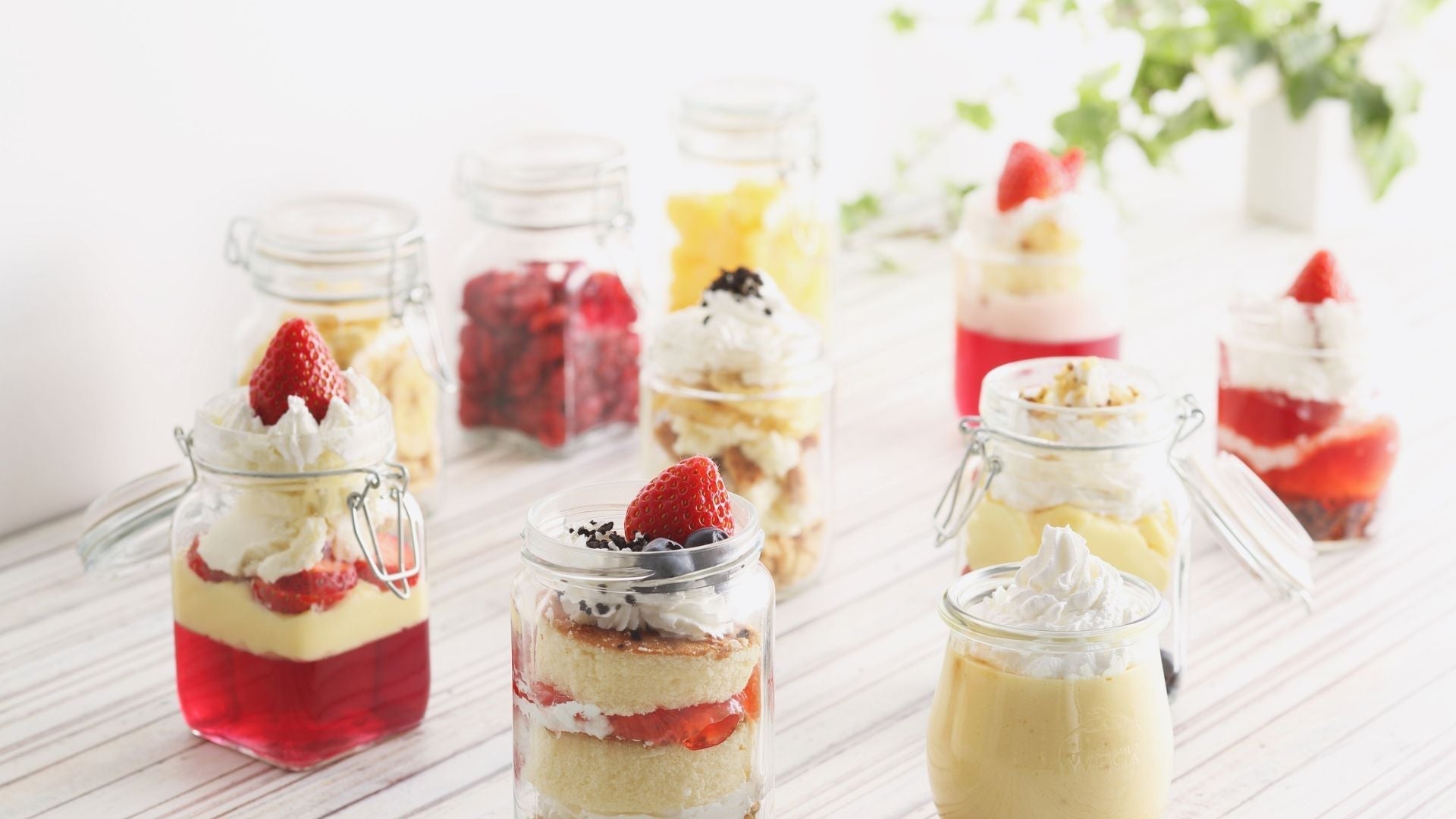 Beautiful desserts paired with fresh fruit on a dining table