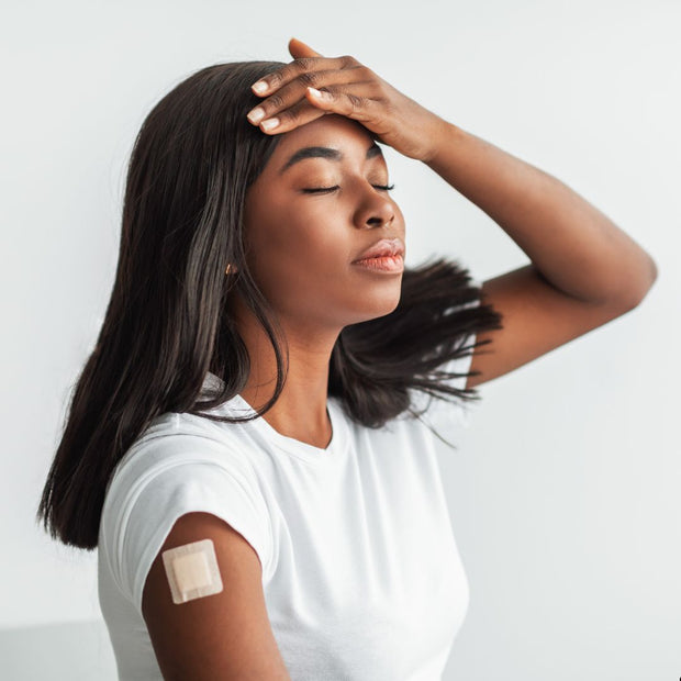Woman with bandaged arm representing common health problems requiring natural treatment solutions